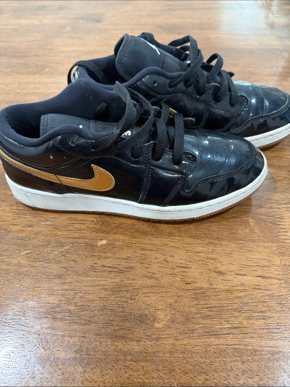 Jordan Kids Black Sneakers with Gold Swoosh size 6.5y